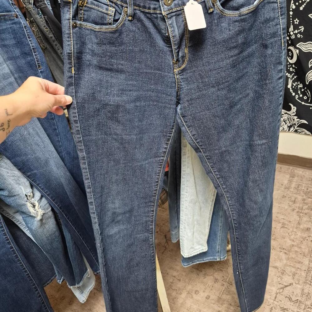 Blue denim jeans with gold